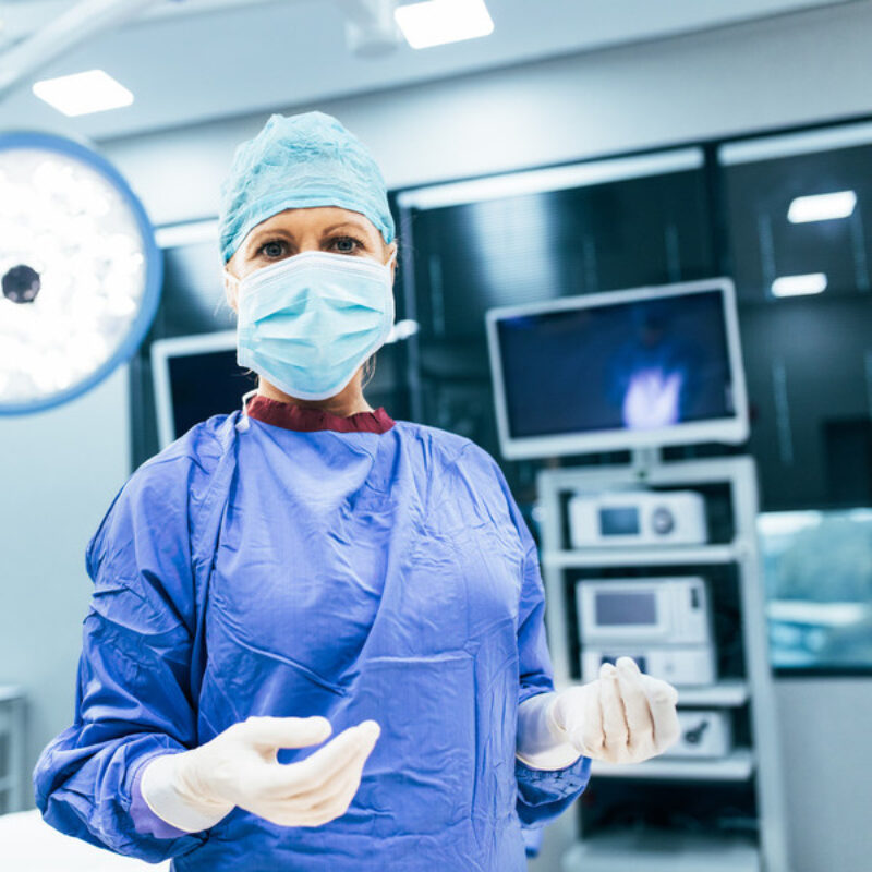 Doctor in surgical scrubs in operating room