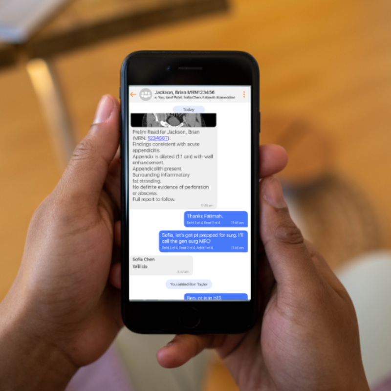 Smartphone using Ikonix Connect being held in two hands