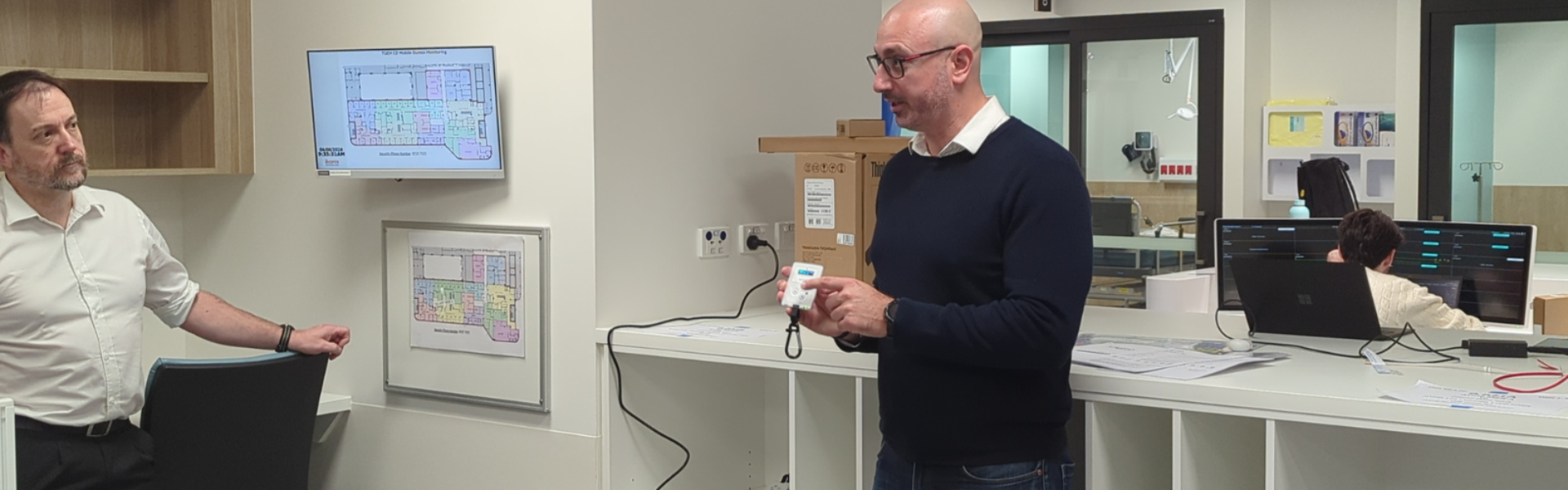 Project Manager and Ikonix Technology Director Reza Forozandeh demonstrating the solution to TQEH’s ED staff before the building opens.